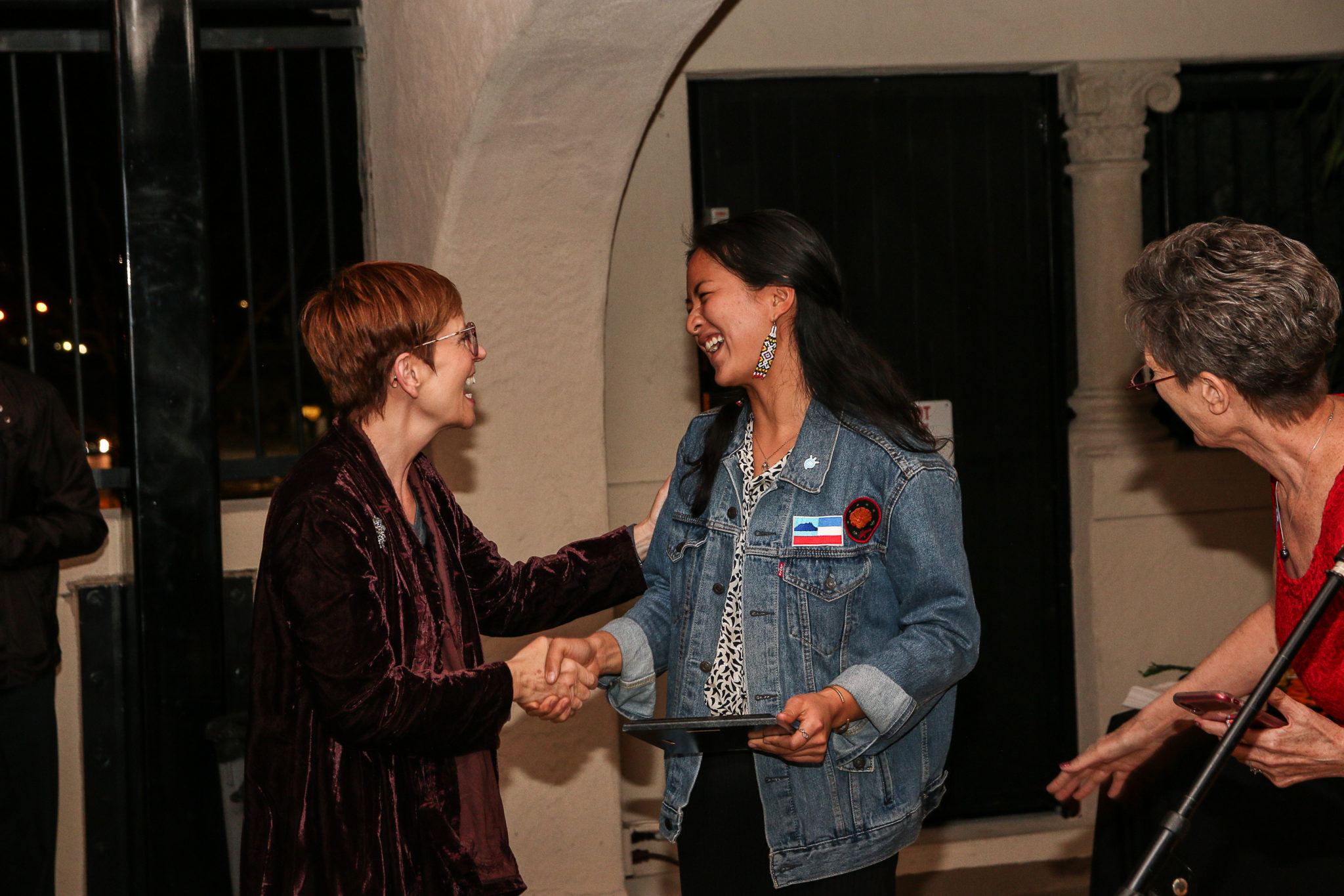 Jaylene Chung receives her award from Dr. Fehr the Young Alumni Rooftop Reunion 2020